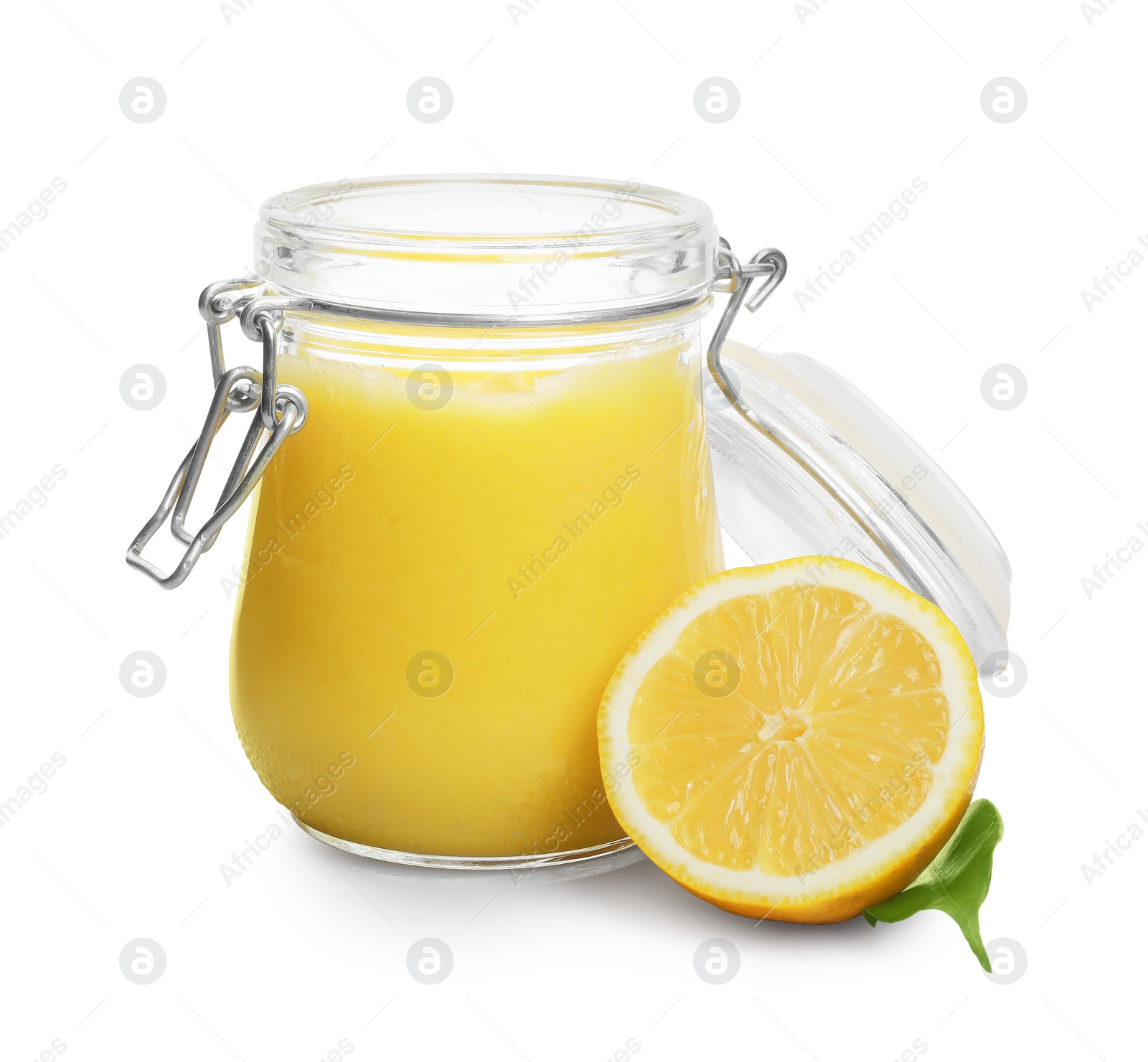 Photo of Delicious lemon curd in glass jar, fresh citrus fruit and green leaf isolated on white