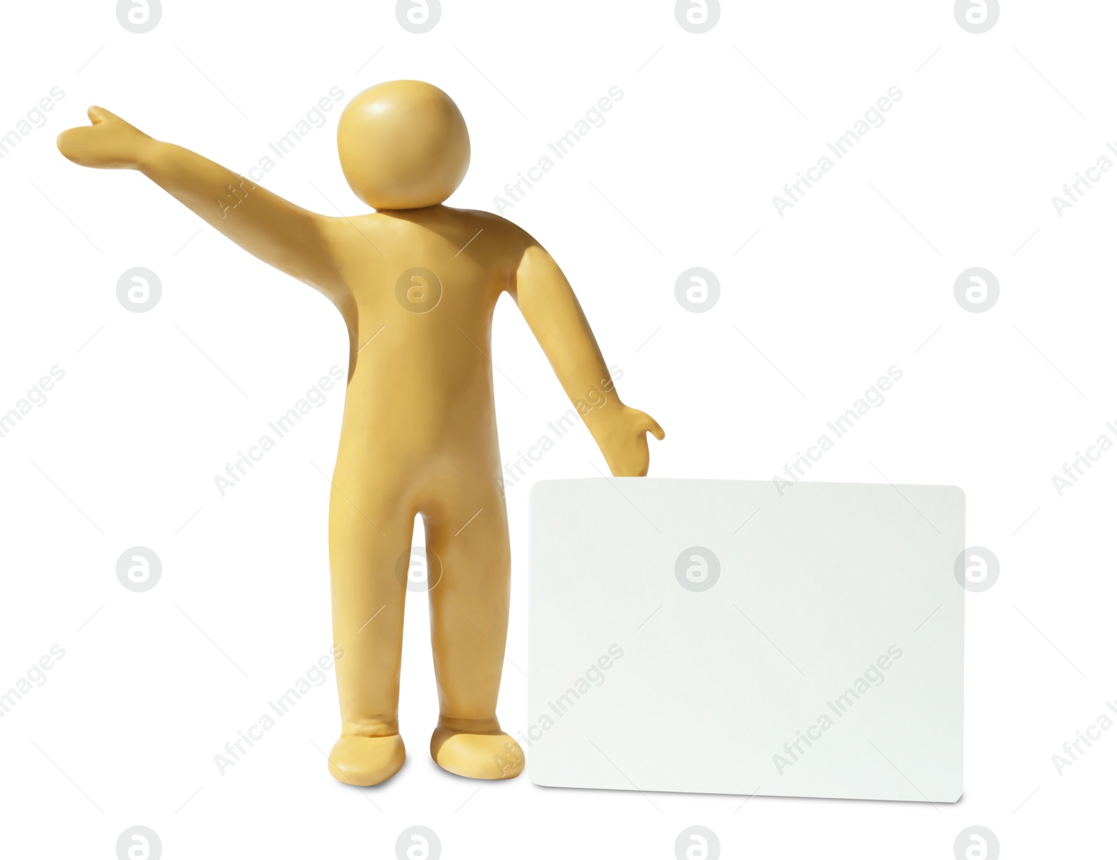 Photo of Yellow plasticine human figure with blank card isolated on white, space for text