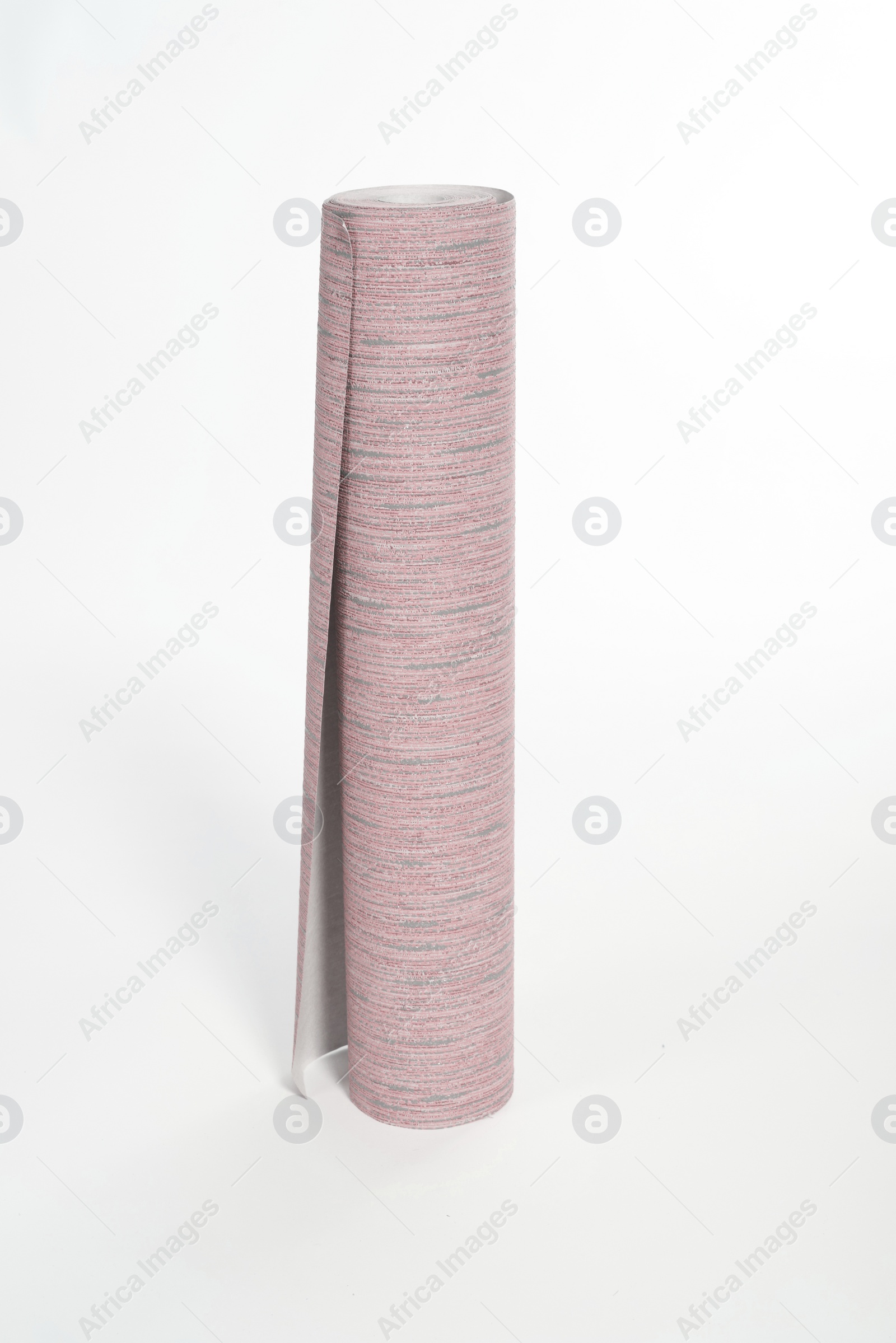 Image of One pink wallpaper roll isolated on white