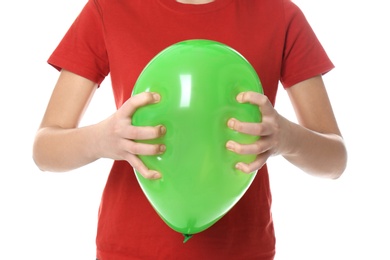 Photo of Woman squeezing green balloon on white background, closeup