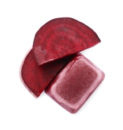 Photo of Frozen beetroot puree cube and fresh beetroot isolated on white, top view