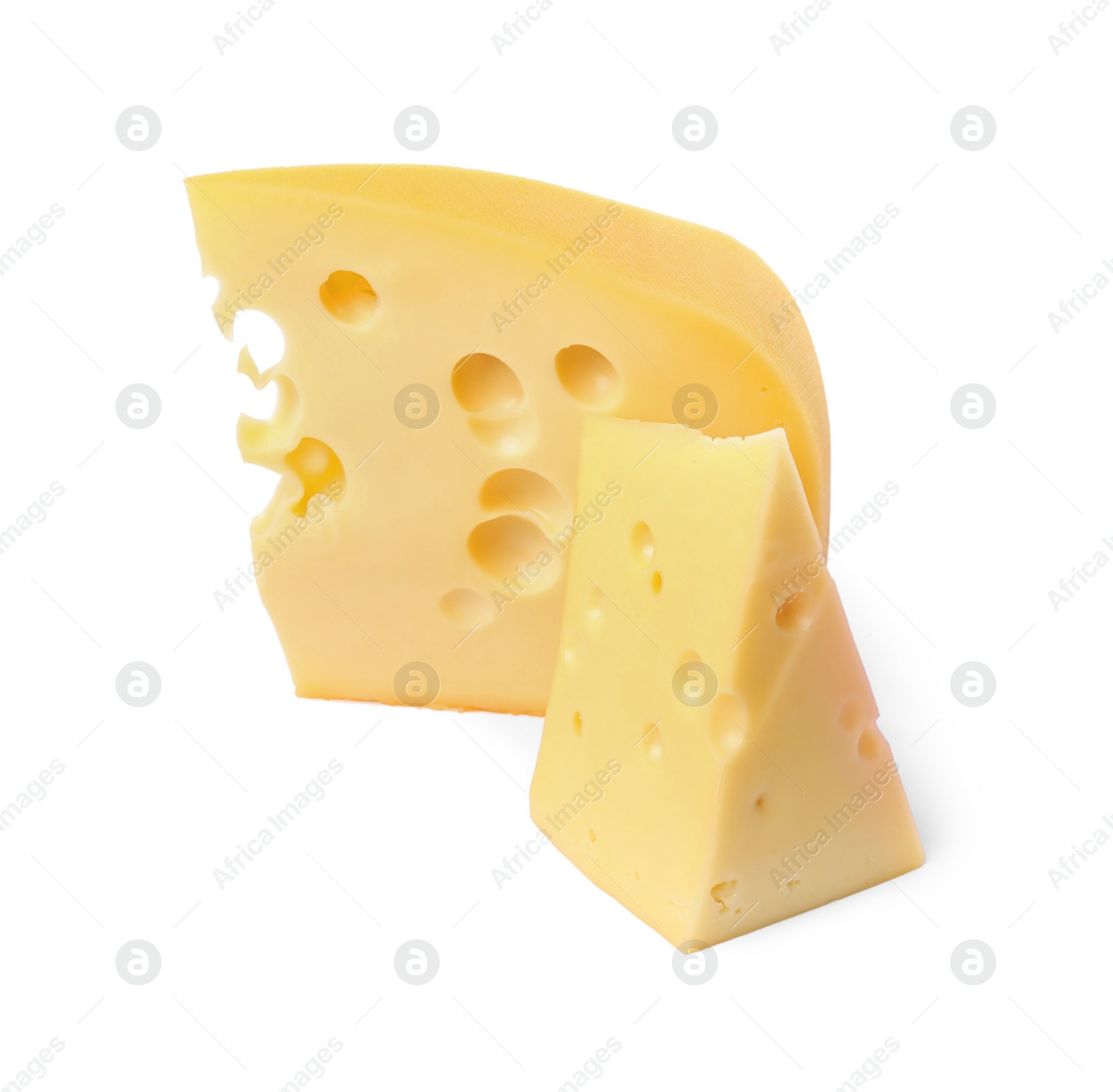 Photo of Pieces of delicious cheese isolated on white