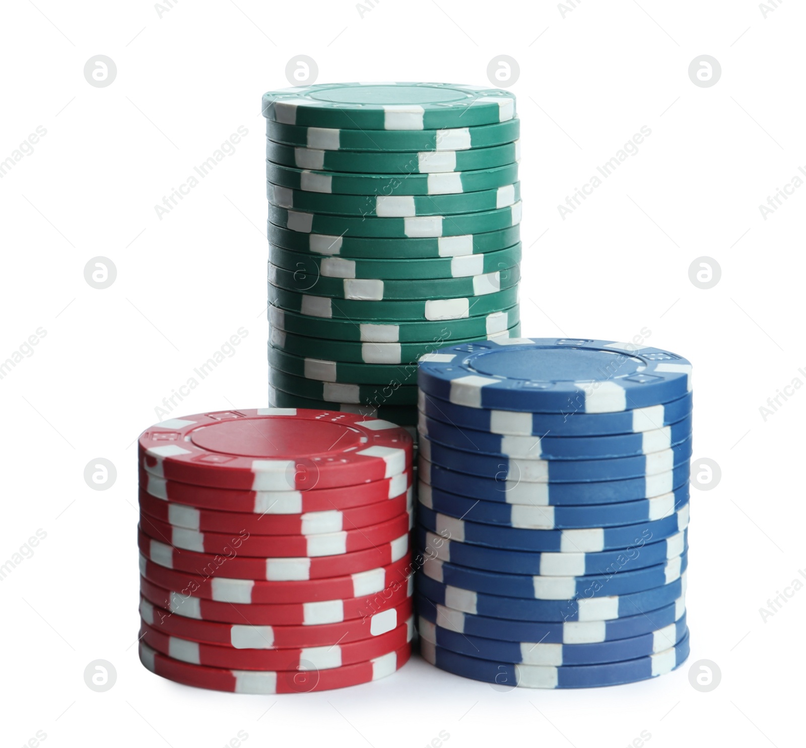 Photo of Plastic casino chips stacked on white background. Poker game