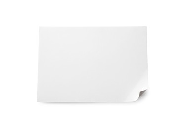 Photo of Blank paper sheet with turned down corner isolated on white, top view