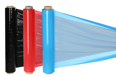 Image of Rolls of colorful plastic stretch wrap on white background