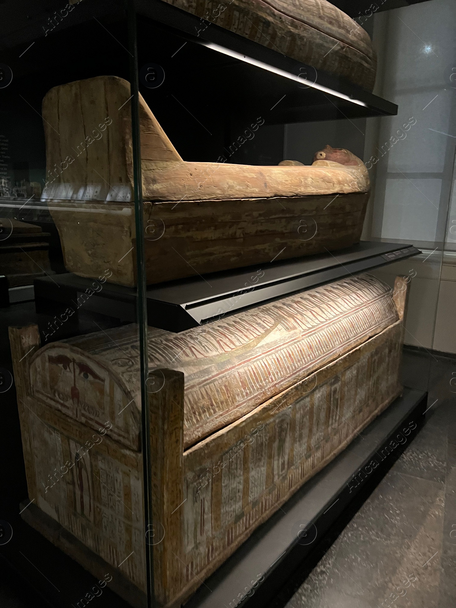 Photo of LEIDEN, NETHERLANDS - AUGUST 07, 2022: Display with Ancient Egyptian sarcophagi in National Museum of Antiquities (Rijksmuseum van Oudheden)