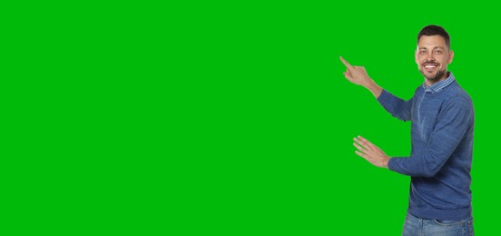 Chroma key compositing. Broadcaster against green screen, banner design