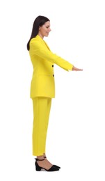 Beautiful businesswoman in yellow suit on white background