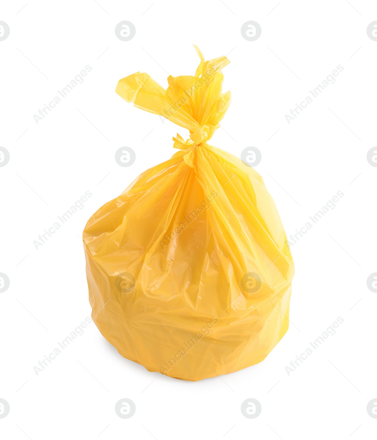 Photo of Yellow plastic garbage bag isolated on white