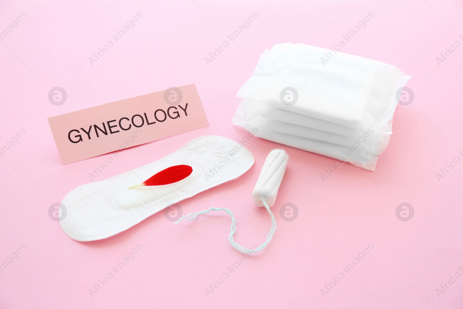 Photo of Composition with tampon and menstrual pads on color background. Gynecological care