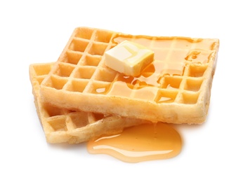 Photo of Delicious waffles with butter and honey on white background