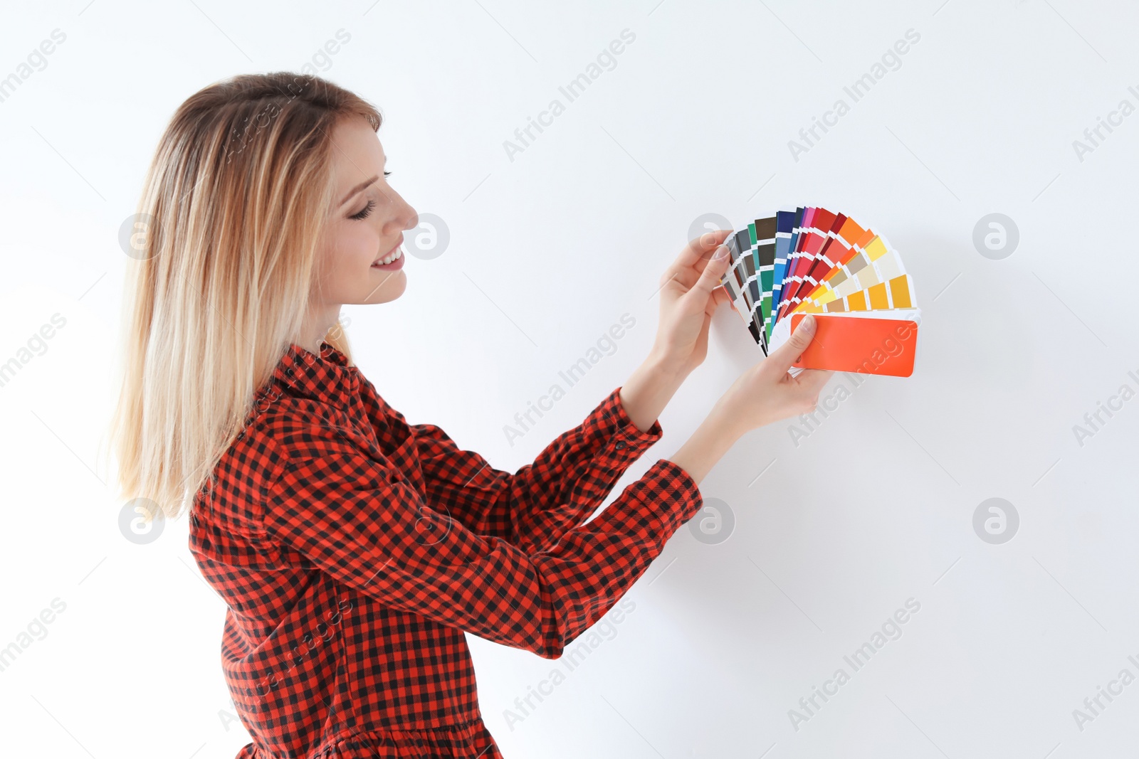 Photo of Young woman with color palette on white background