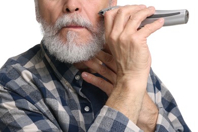 Photo of Man trimming beard on white background, closeup