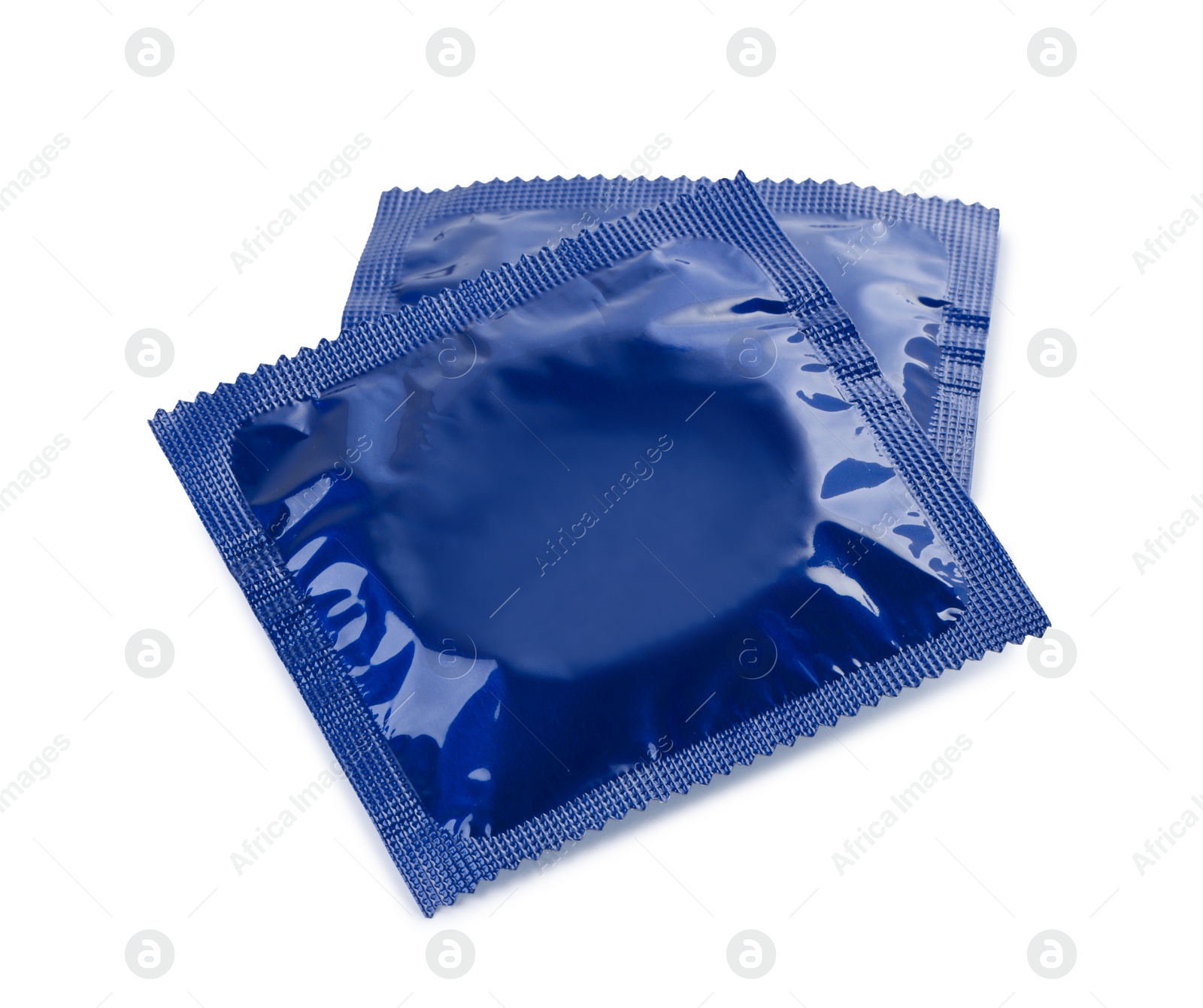 Photo of Packaged condoms on white background. Safe sex