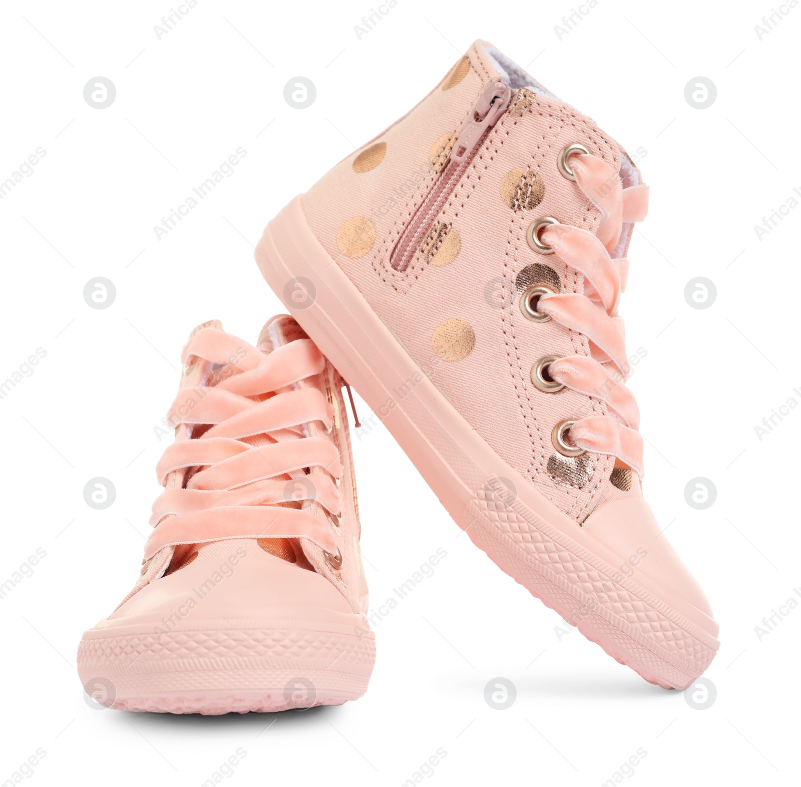 Photo of Pair of stylish child shoes on white background