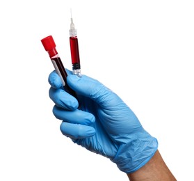 Photo of Nurse holding syringe and sample tube with blood on white background, closeup