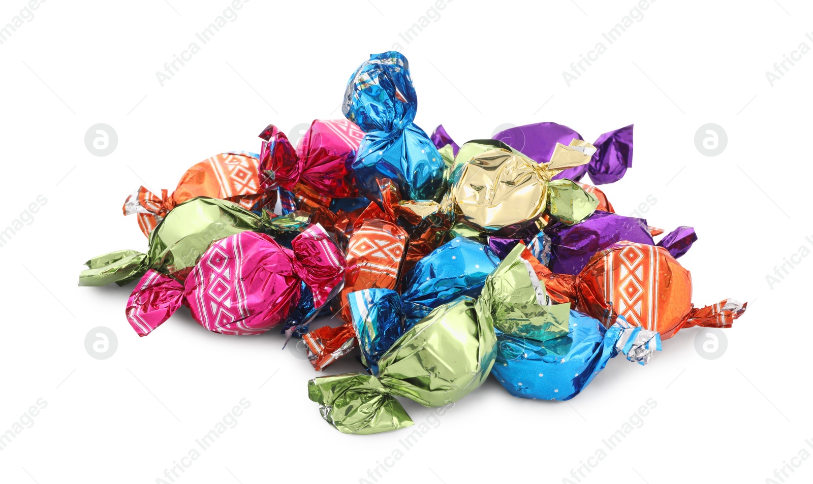 Photo of Pile of sweet candies in colorful wrappers on white background