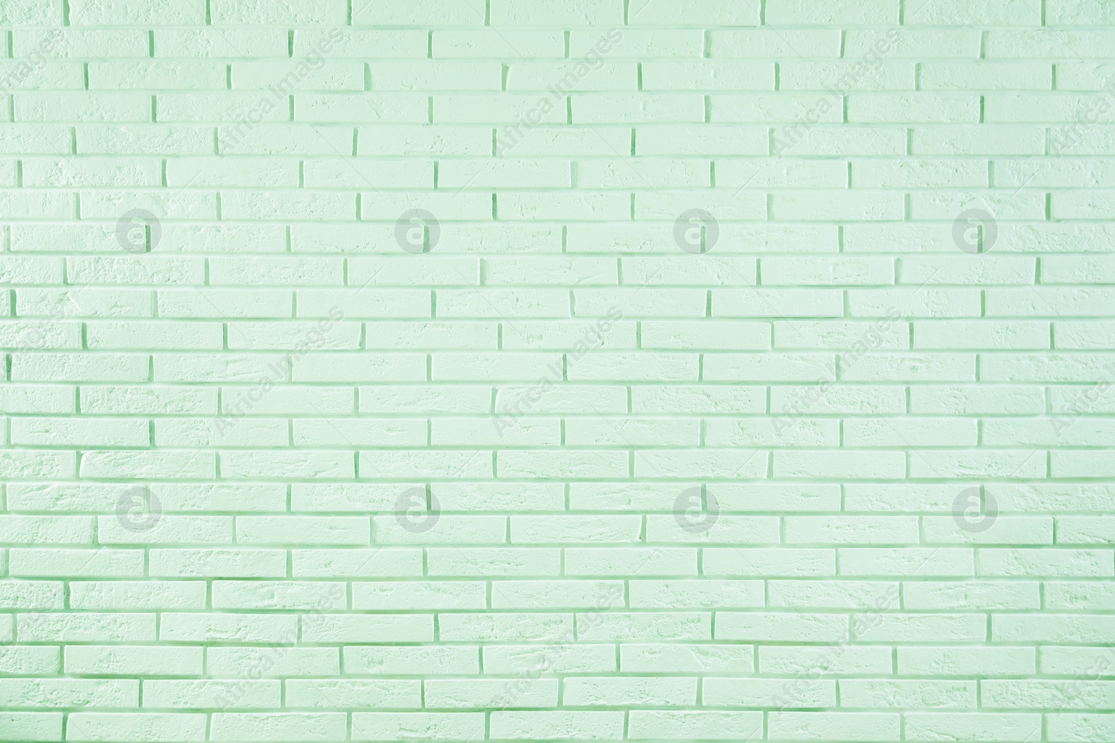 Image of Brick wall as background. Image toned in mint color 