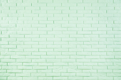 Image of Brick wall as background. Image toned in mint color 