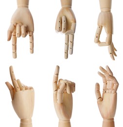 Image of Set with wooden hands of mannequins showing different gestures on white background