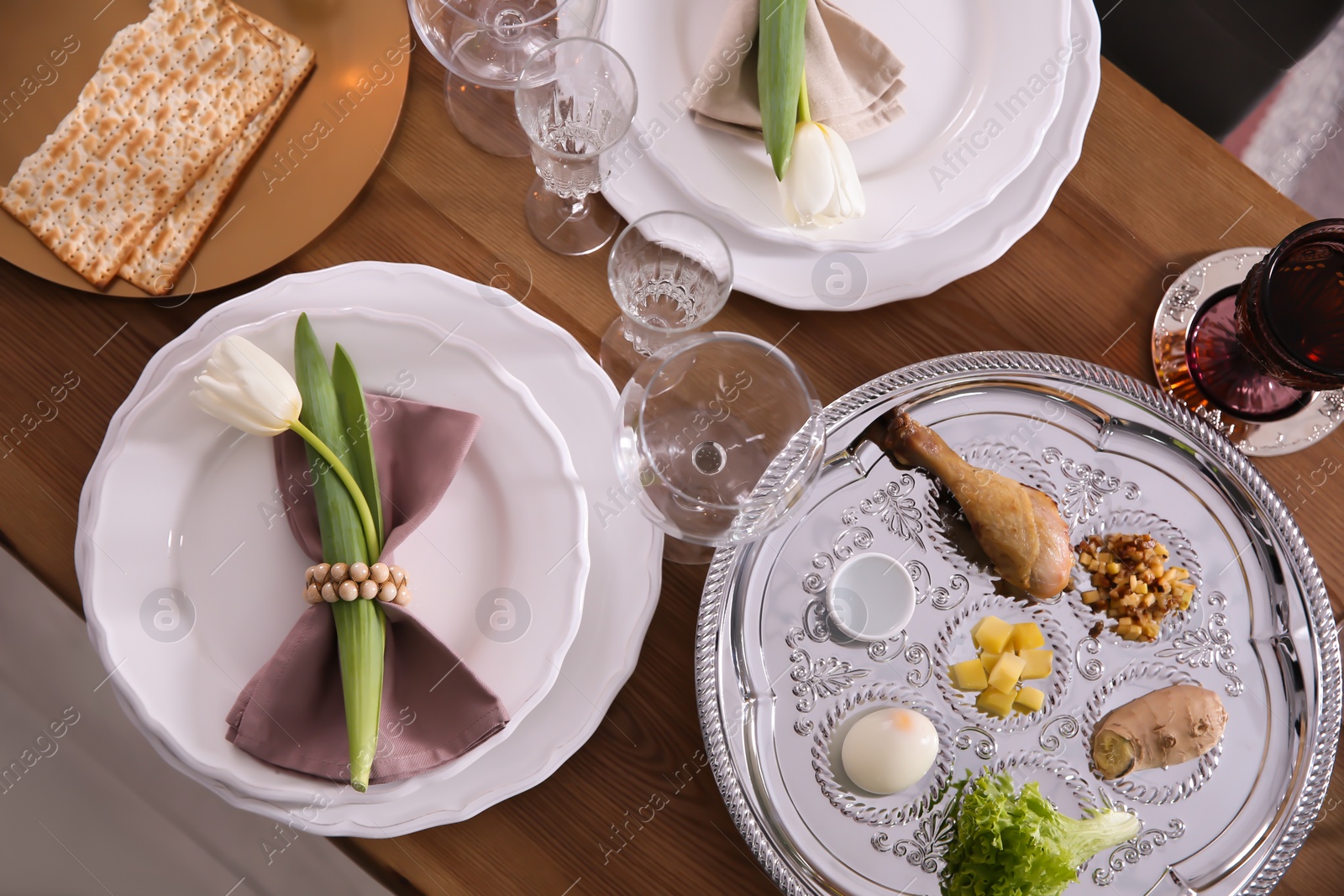 Photo of Festive Passover table setting, top view. Pesach celebration