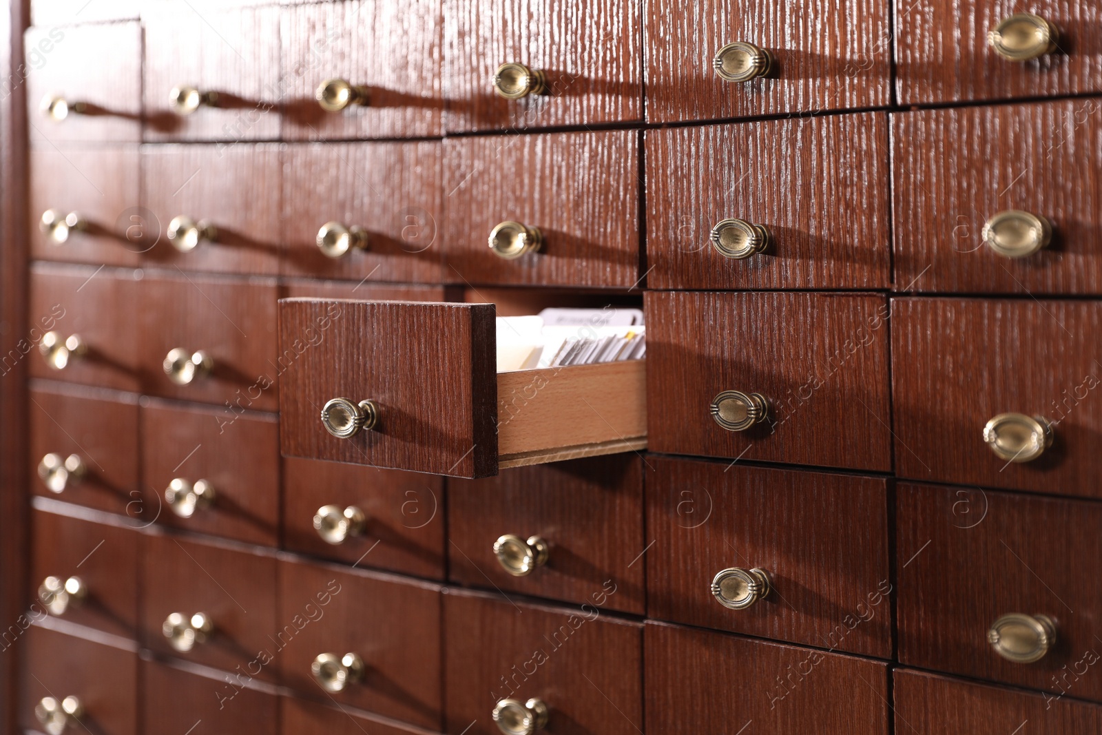 Photo of Open wooden drawer with index cards of library catalog