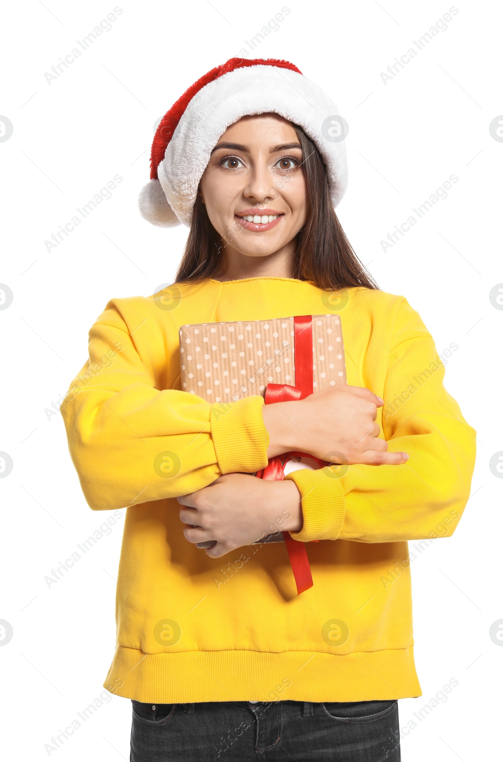 Photo of Young woman with Christmas gift on white background