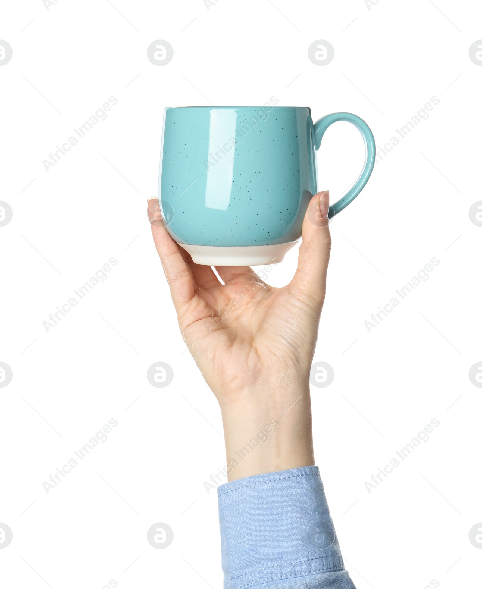 Photo of Woman holding light blue cup on white background, closeup