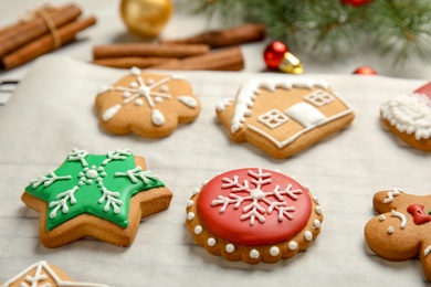 Photo of Tasty homemade Christmas cookies on parchment paper