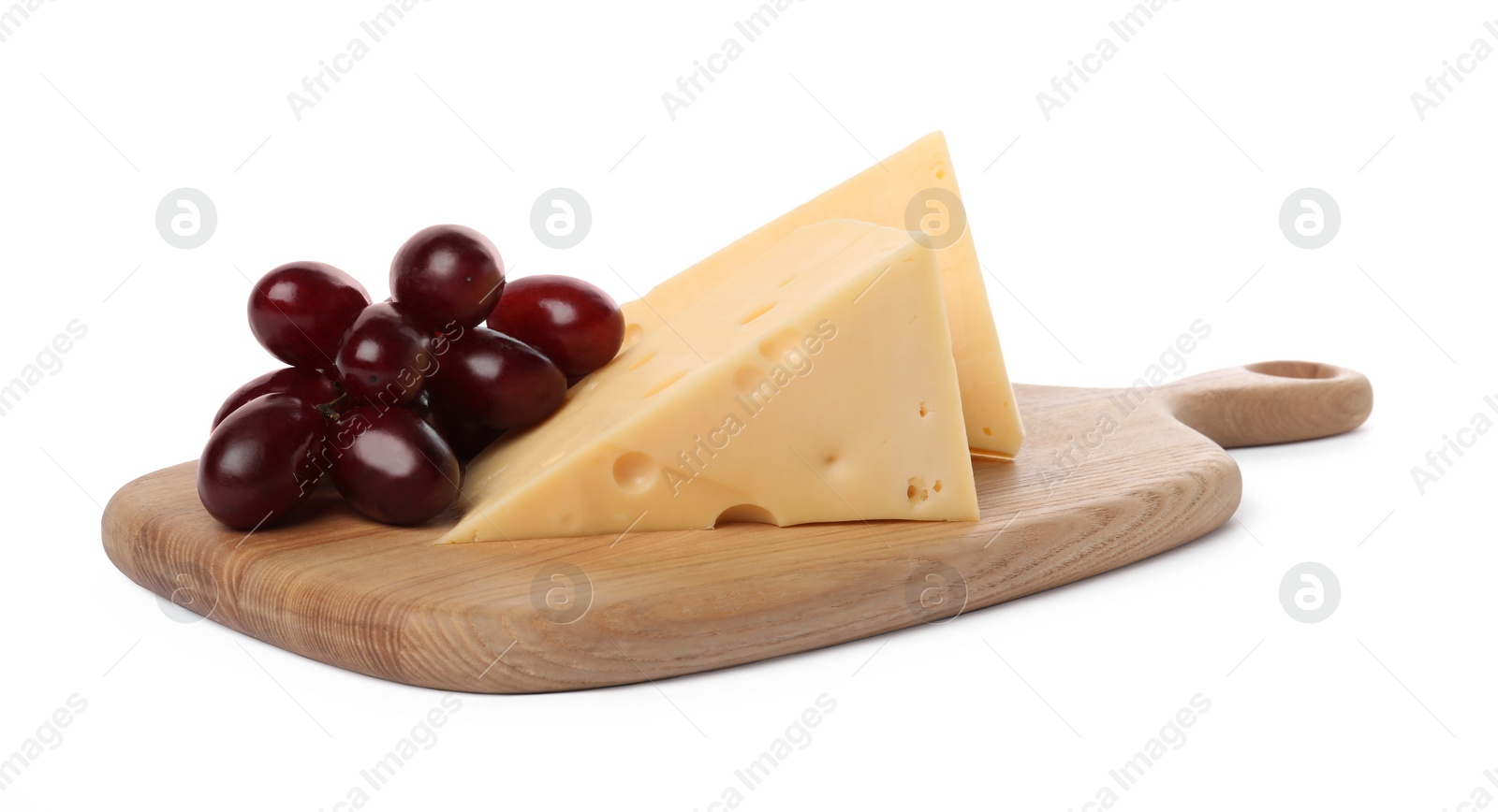 Photo of Pieces of delicious cheese and grapes isolated on white