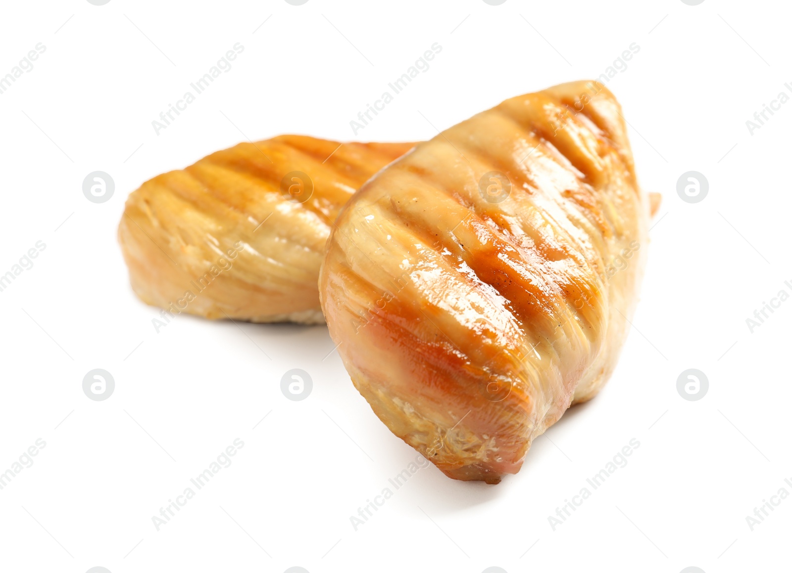 Photo of Delicious grilled chicken breasts on white background