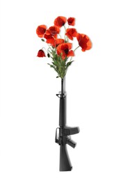 Beautiful blooming poppy flowers and assault rifle on white background. Peace instead of war