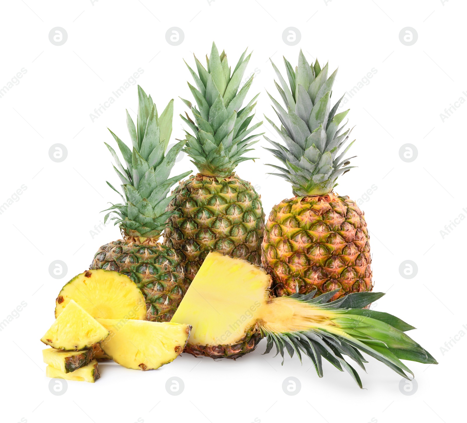 Image of Cut and whole pineapples isolated on white