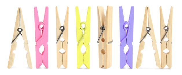 Image of Set with wooden clothespins on white background. Banner design