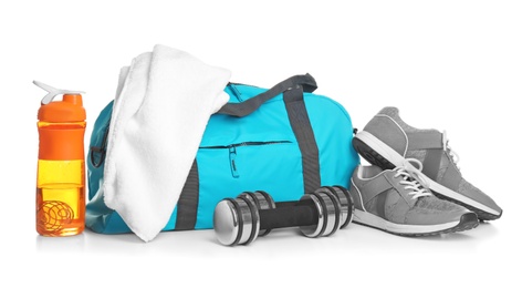 Photo of Sports bag and gym stuff on white background