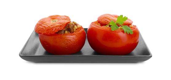 Plate of delicious stuffed tomatoes isolated on white