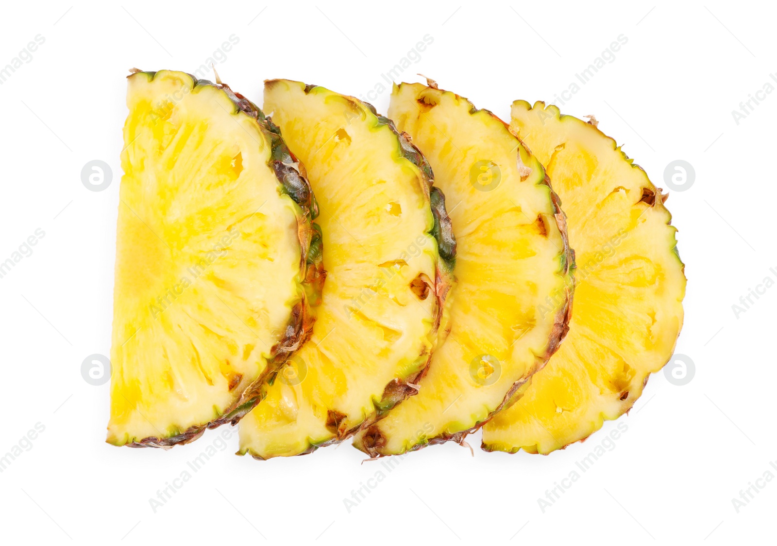 Photo of Slices of tasty ripe pineapple isolated on white, top view