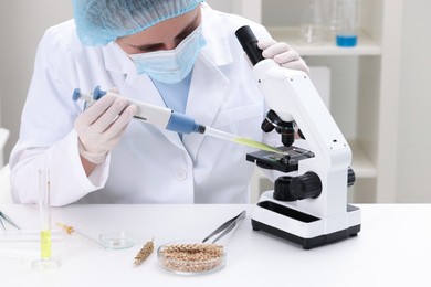 Photo of Quality control. Food inspector working in laboratory