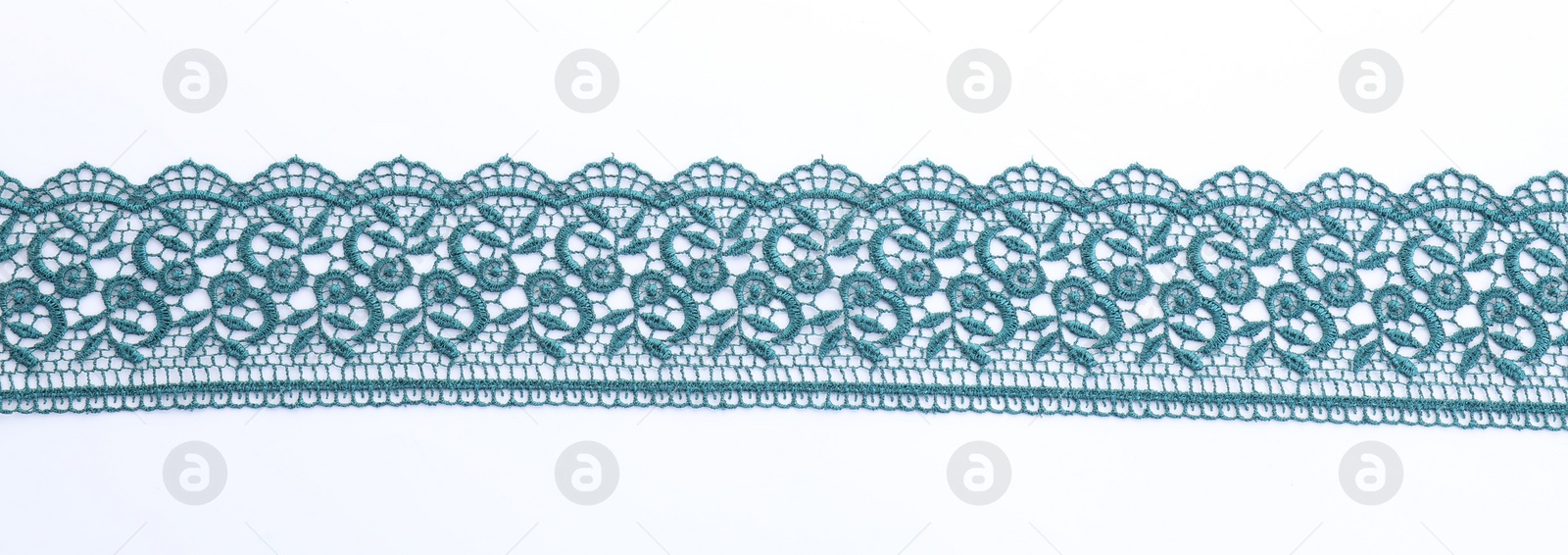 Photo of Beautiful lace on white background, top view