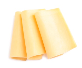 Photo of Slices of tasty cheese on white background, top view
