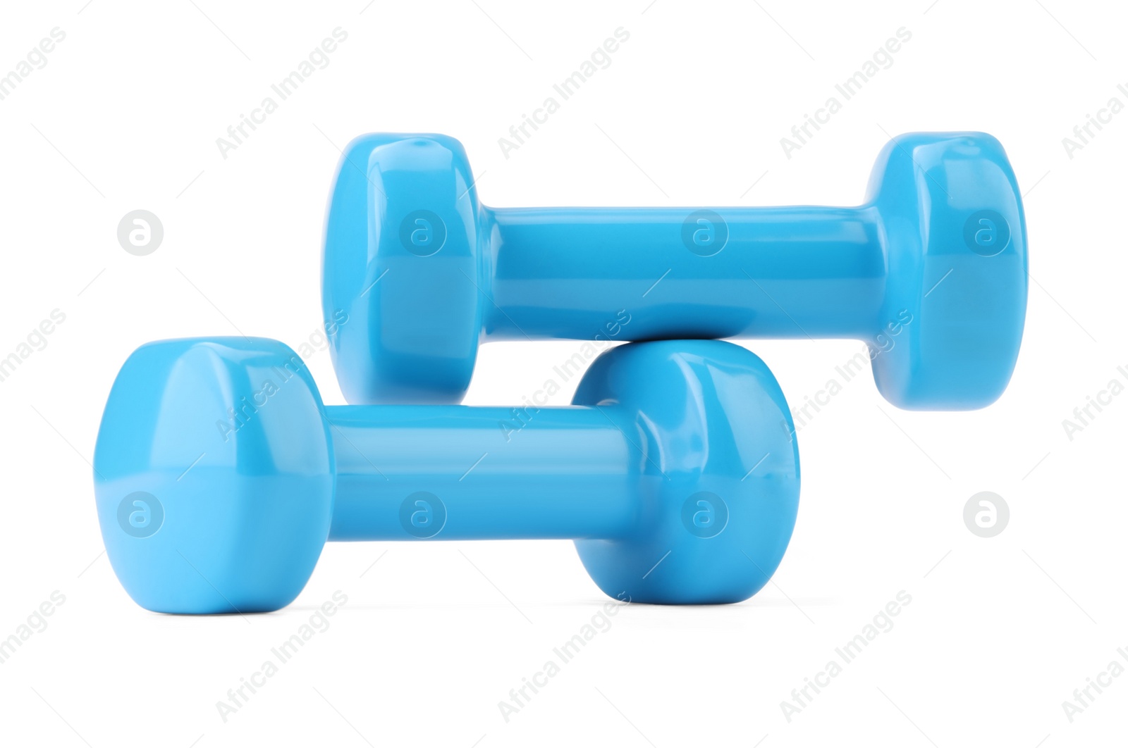 Photo of Light blue dumbbells isolated on white. Sports equipment