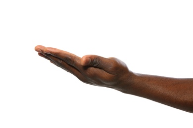 Photo of African-American man holding something in hand on white background, closeup