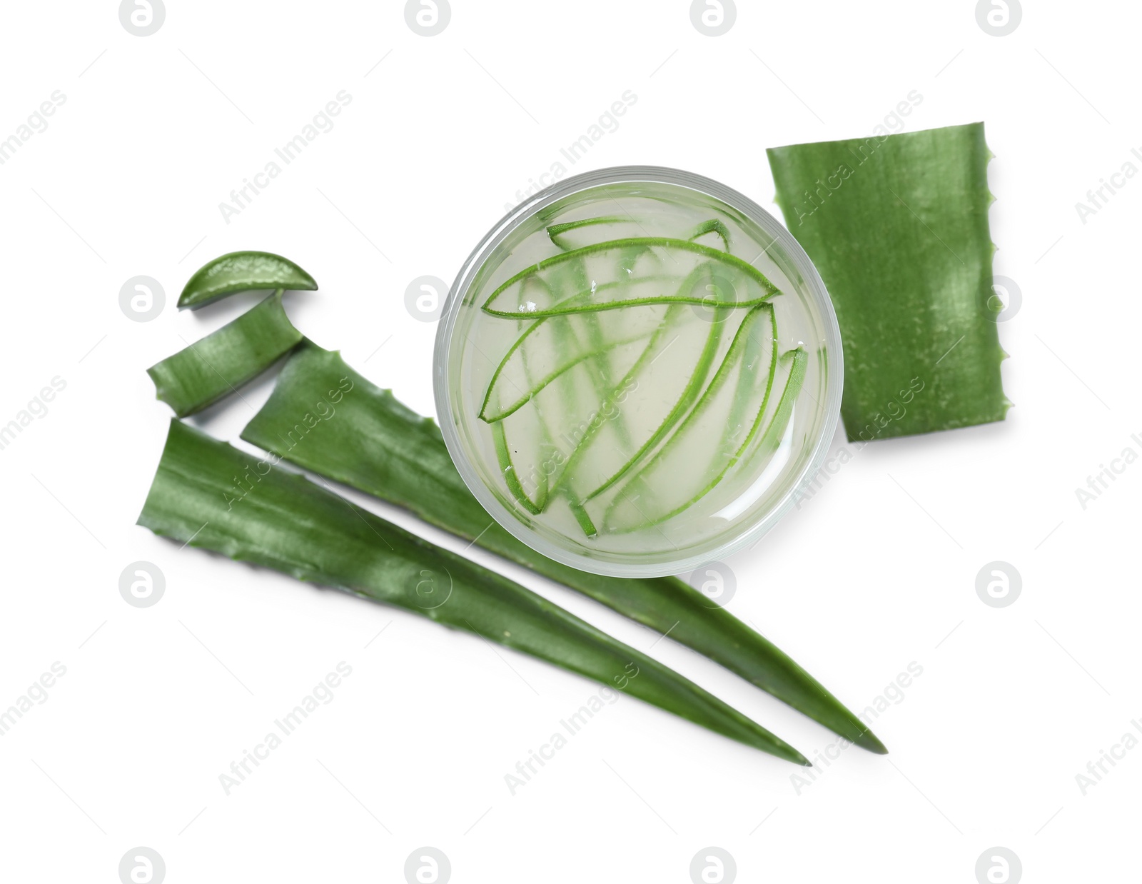 Photo of Tasty aloe juice in glass and cut leaves isolated on white, top view