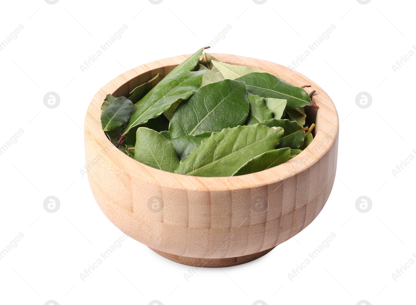 Photo of Wooden bowl with bay leaves on white background