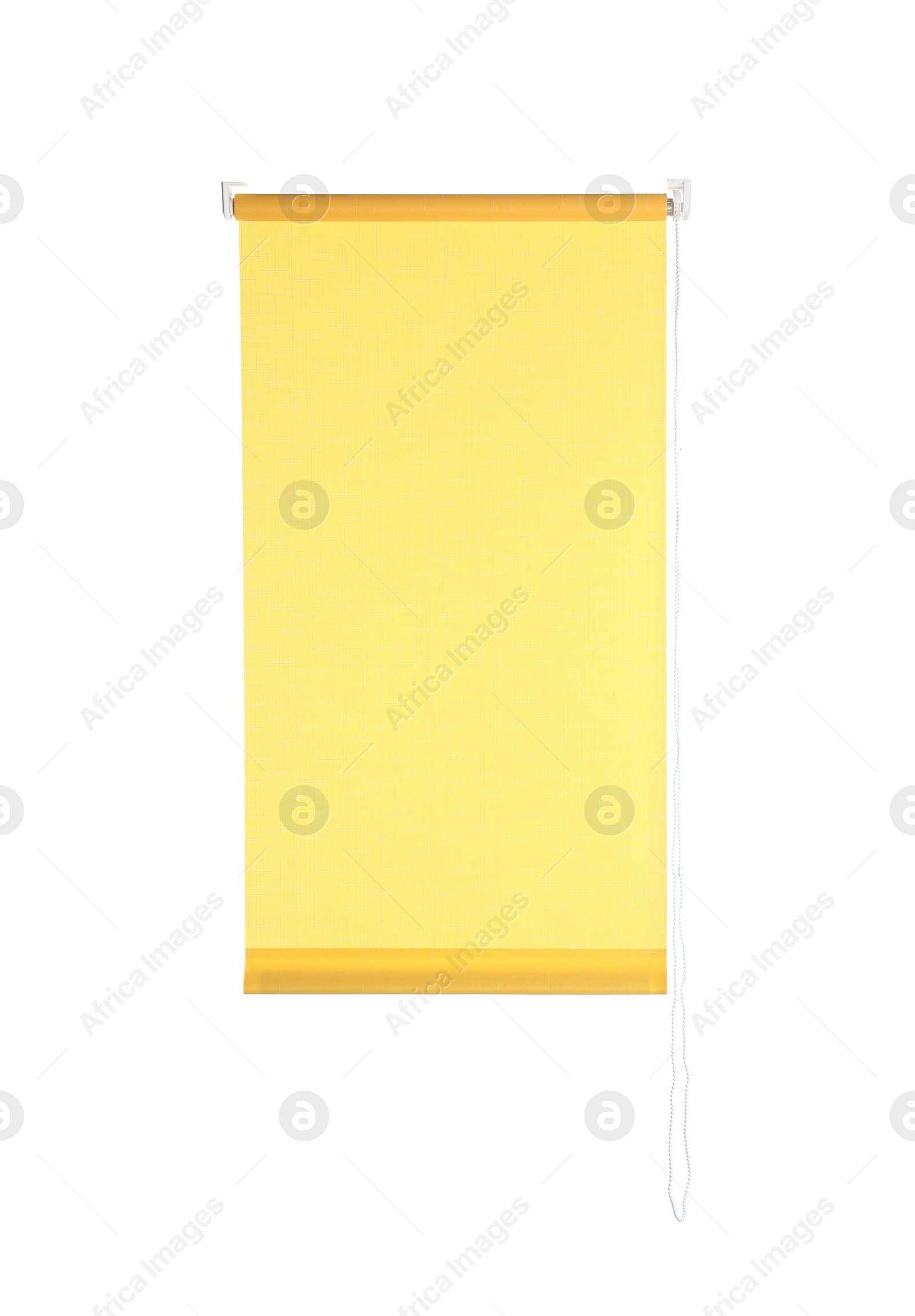 Photo of Yellow window roller blind isolated on white