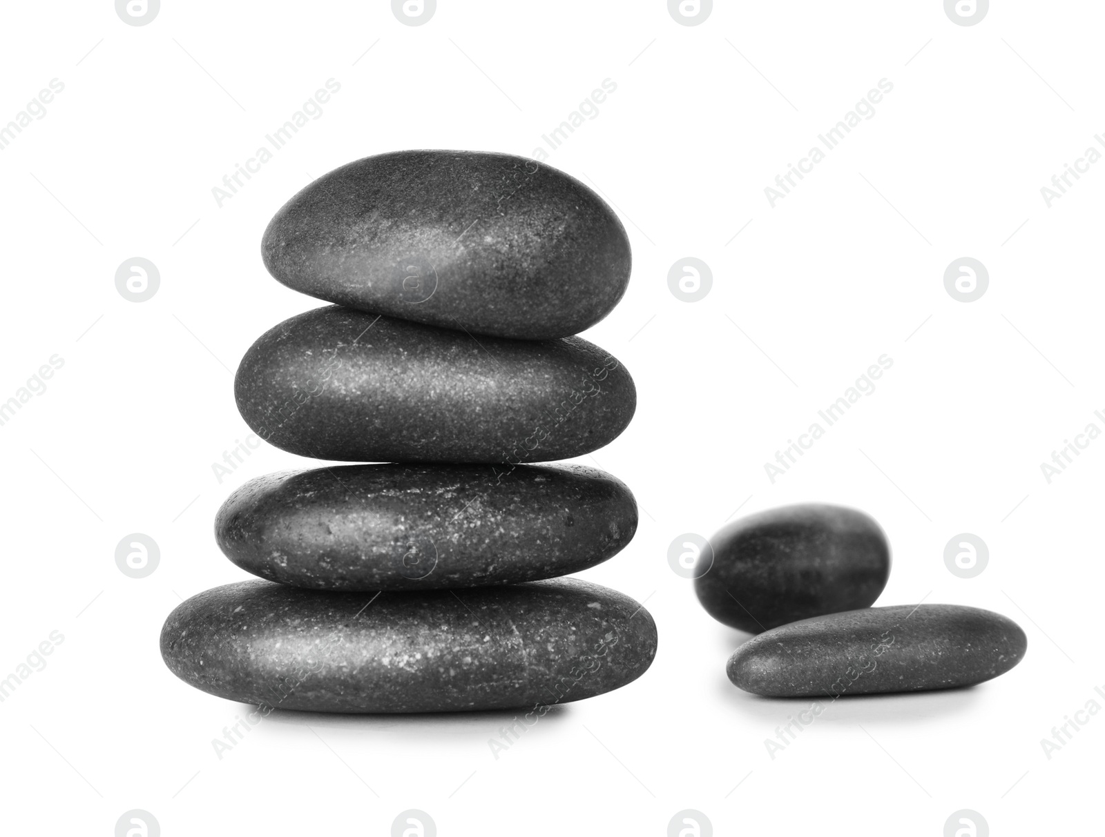 Photo of Stack of spa stones on white background