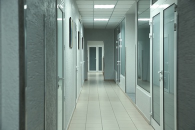 Photo of Light clean empty corridor in modern hospital