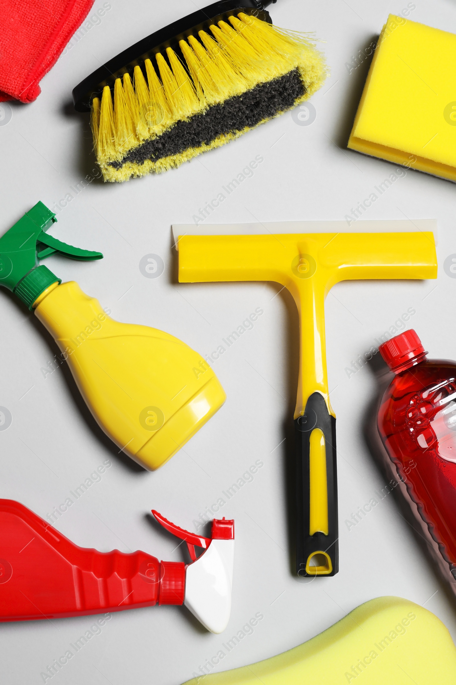 Photo of Different car products on light grey background, flat lay