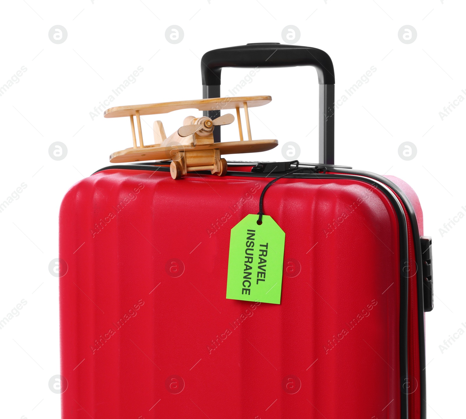 Photo of Red suitcase with TRAVEL INSURANCE label on white background