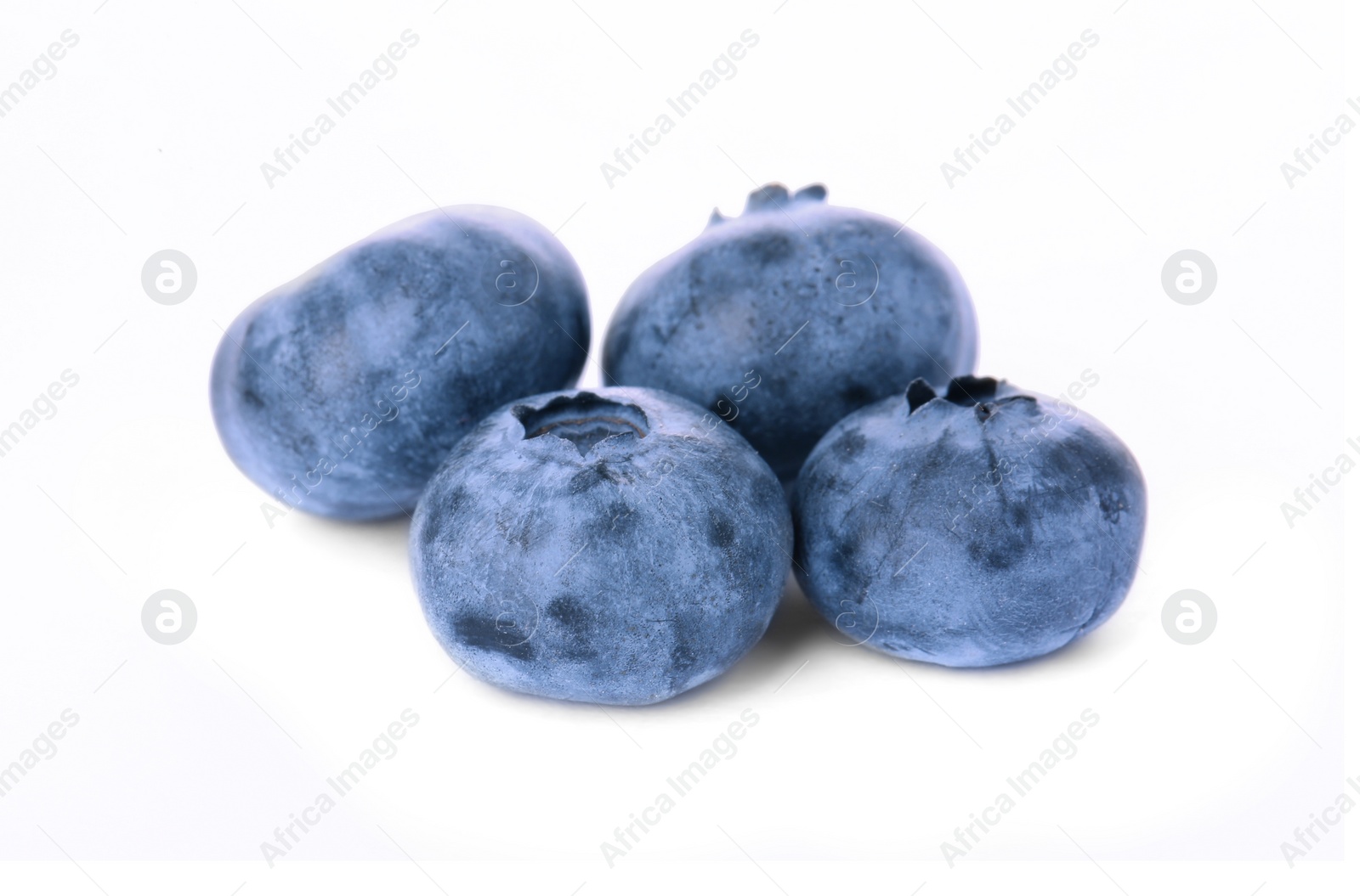 Photo of Pile of tasty fresh ripe blueberries on white background